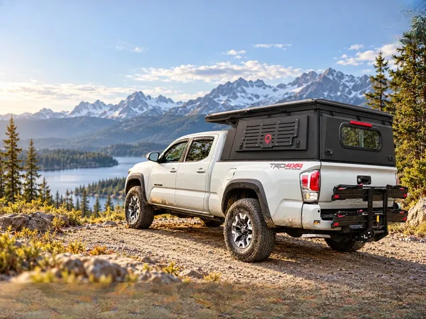 Integrated pop-up topper closed — tent folded down on the pickup