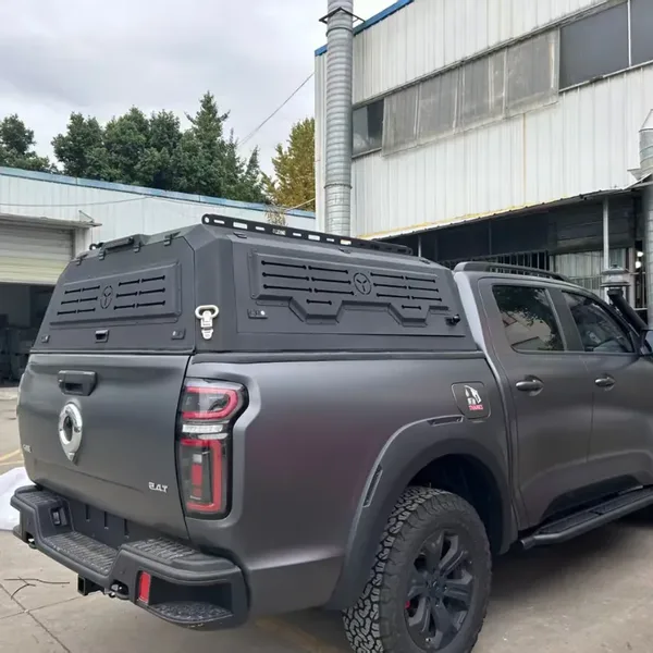 SUNHOMEE truck topper with vented side panels on a gray pickup